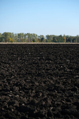 Freshly plowed chernozem before sowing. Soil texture in agriculture. Freshly plowed field. Close up
