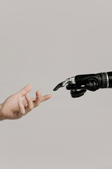  man and bionic arm a robot hand touching a mans hand