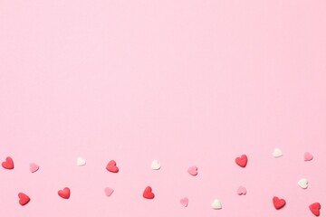Beautiful hearts on pink background
