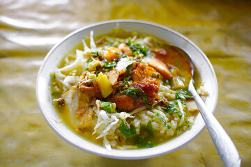 Soto ayam is a typical Indonesian dish in the form of chicken soup with yellowish sauce. This yellow color is due to turmeric which is used as a spice, indonesian food. 