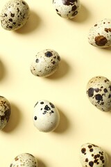 Quail eggs on color background