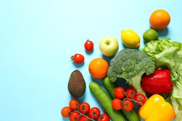 Clean healthy eating habits concept. Fruits, herbs, greens and vegetables mix, colorful juicy organic detox smoothie juice ingredients, color background. Vegan vegetarian diet food