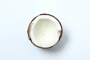 Coconut on white background, top view