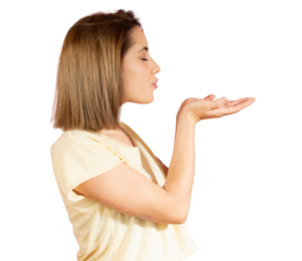 Close up portrait of a beautiful woman in casual t-shirt sending an air kiss over transparent background. PNG transparent.