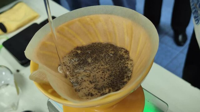 Pouring in a steady, circular motion helps distribute the water evenly. - The more water you pour in one spot, the more that area will be extracted. So pour evenly. 