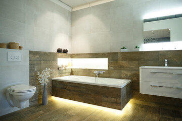 Modern bathroom design with elegant fixtures and ambient lighting in a contemporary setting