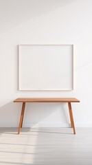 Wooden table with a square frame hanging in a minimalist white room.