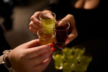 Cheers to a Fantastic Celebration Friends Joyfully Toasting with Wine Glasses in Hand