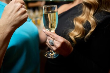 Cheers to a Fantastic Celebration Friends Joyfully Toasting with Wine Glasses in Hand
