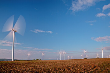 wind turbines in an open field