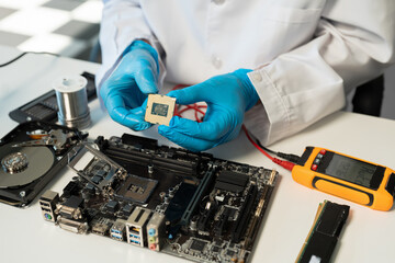 Close up of Technician measuring voltage electronic circuit board, Service after sale fix electric equipment.