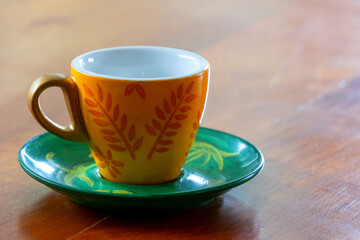 decorated single coffee cup small espresso on a table top