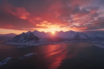 Fototapeta premium Fiery Sunset Over Snowy Mountains and Calm Fjord