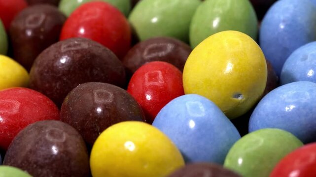 colorful chocolate candies background. Close up shot. Selective focus