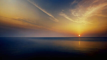 Obraz premium Sunset Over the Ocean with Orange and Blue Sky