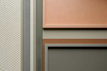 Fototapeta premium Abstract image featuring textured wall panels in muted earth tones; sage, terracotta, and beige hues. Ideal for interior design, architecture, and home decor projects.