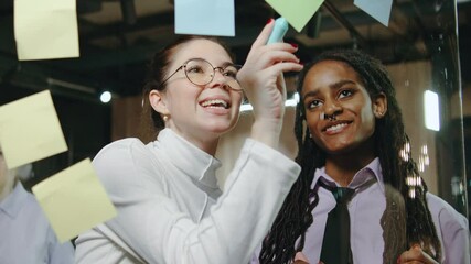 In a vibrant office, diverse professionals collaborate dynamically, allowing fresh ideas to flourish and innovative solutions to thrive through teamwork and open communication