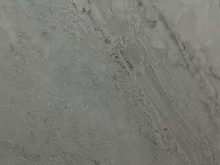 smooth gray marble texture with subtle veins and natural patterns, ideal for interior design, countertops, and modern aesthetic backdrops
