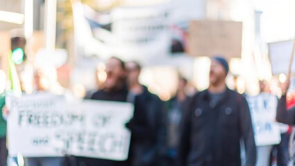 Freedom of Speech Blur: A blurred photo of people participating in a protest for freedom of speech and expression.	
