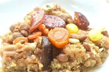 sticky rice steam with pork and salt egg couple wholegrain of Chinese Duanwu festival on plate