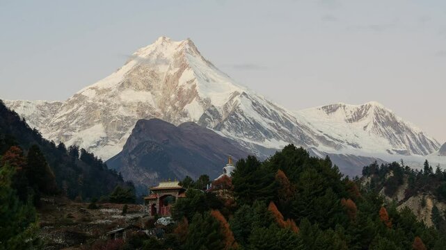 Manaslu, Nepal: Stunning sunrise time lapse over the Manaslu peak and the Lho Tibetan buddhist monastery in the Himalaya in Nepal. 