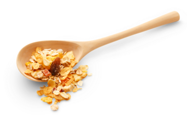 Heap of musli with raisin in wooden spoon