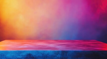 Colorful tabletop with vibrant gradient of orange purple and blue hues angled view ample empty space for text or product display