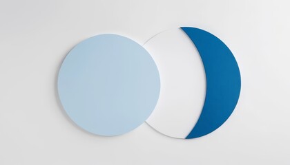 An artistic arrangement of overlapping circles in soft blue and white tones, creating a contemporary and minimalist design perfect for modern spaces.