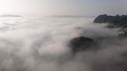Clouds on high mountain peaks in the rainy season in the Asian rainforest..