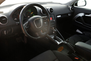 black and chrome interior of a black car