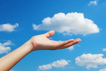 Open hand reaching for the clouds, symbolizing hope and aspiration