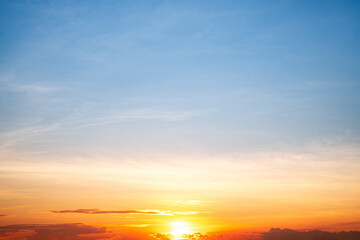 Sky,sunset, beautiful , luxury soft gradient orange gold clouds and sunlight on the blue sky perfect for the background, Sunrise on morning or everning in winter warm time ,Twilight summer,silhouette