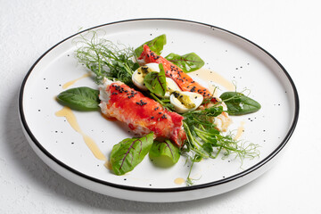 Kamchatka Crab Salad with Quail Eggs and Greens. Healthy Modern Cuisine Concept. Hand Taken Photo, Not AI
