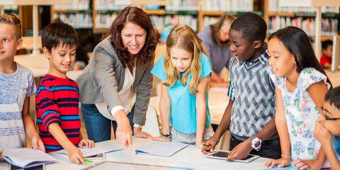 A teacher guides diverse children in a classroom. Kids and teacher engage in learning. Classroom...