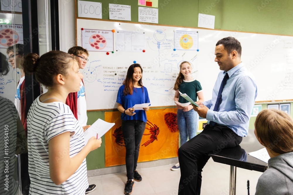 Poster Group of students and a teacher in a classroom discussing. Diverse student group learning in class. Students learning, discussion with teacher in class. High school students with teacher in class