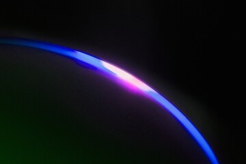 Futuristic black background, purple light effect