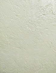 view of decorative plaster. Wavy texture of green and white wall
