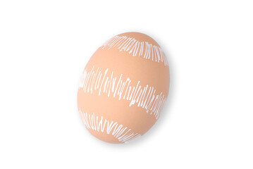 Single natural brown Easter egg with a minimalist white hand-drawn linear pattern isolated on a white background.