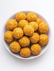 A white bowl filled with assorted nuts and seeds, offering a healthy and flavorful snack choice.