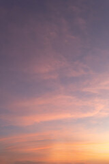 Obraz premium Dramatic cloudscape ablaze with orange and red hues as the sun descends, painting the evening sky with vibrant colors