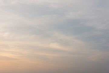 Beautiful cloudscape at sunset, with vibrant orange and red hues painting the sky