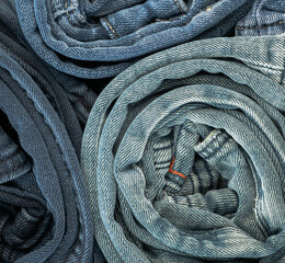 denim jeans fabric rolled and stacked