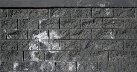 Black concrete brick wall background