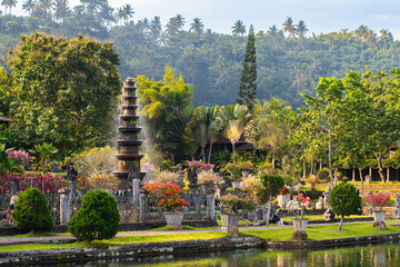 Karangasem royal water palace Tirta Gangga, Bali, Indonesia, with fountains, ponds and garden with...