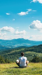 Naklejka premium Reflective journaling in a serene landscape mountainside outdoor experience nature environment personal growth perspective