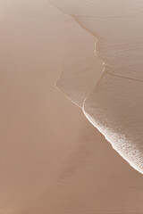Minimalist aesthetic ocean background, copy space, sandy beige texture
