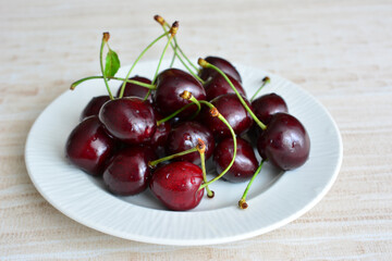 Fresh Cherries on a Plate close up 
