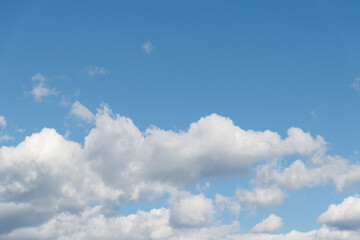 White clouds on clear sky