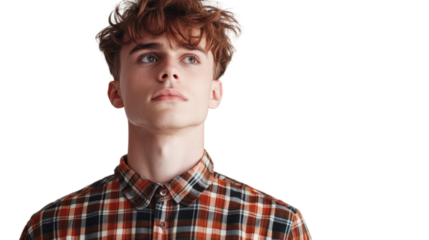 Young man with wavy hair wearing a plaid shirt, standing confidently against a white isolated background.