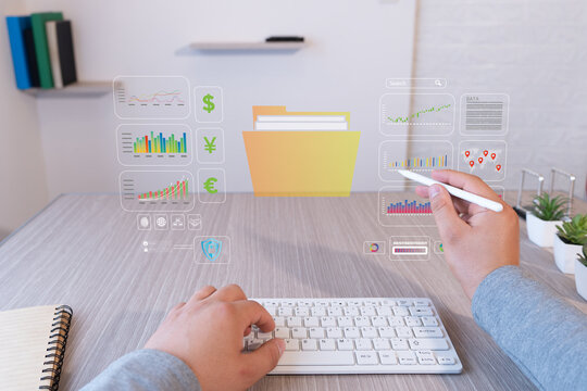 executive holding a stylus and manipulating business data on a holographic display. first person view. subjective shot